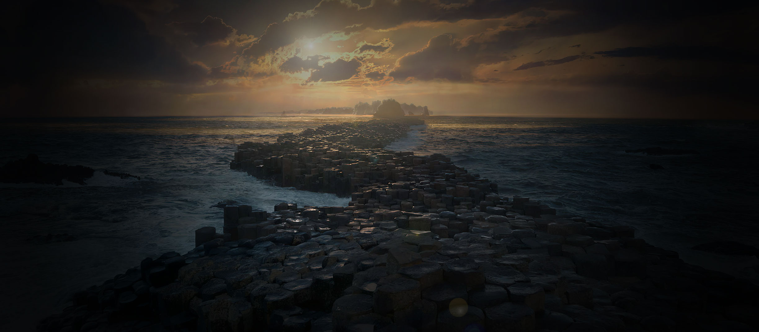 Sunset ocean hitting rocks